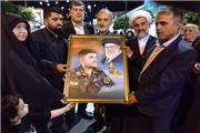 تجلیل از خانواده شهید گیلانی در نود و چهارمین اجتماع مردمی